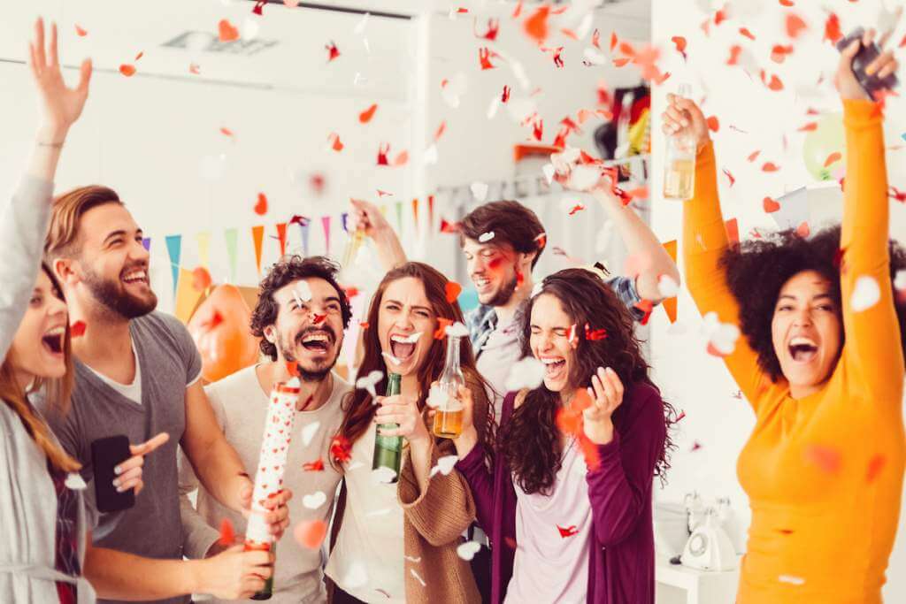 Group of friends at college graduation party