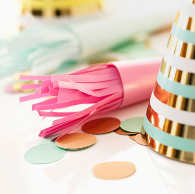 Birthday confetti and party hat