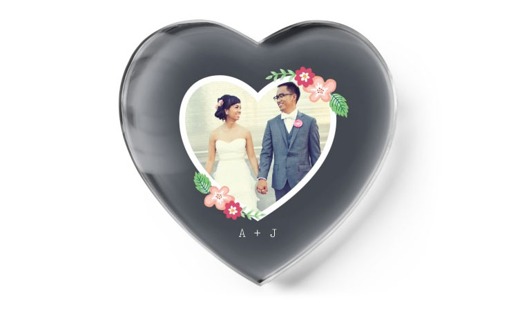 A paperweight with a married couple.
