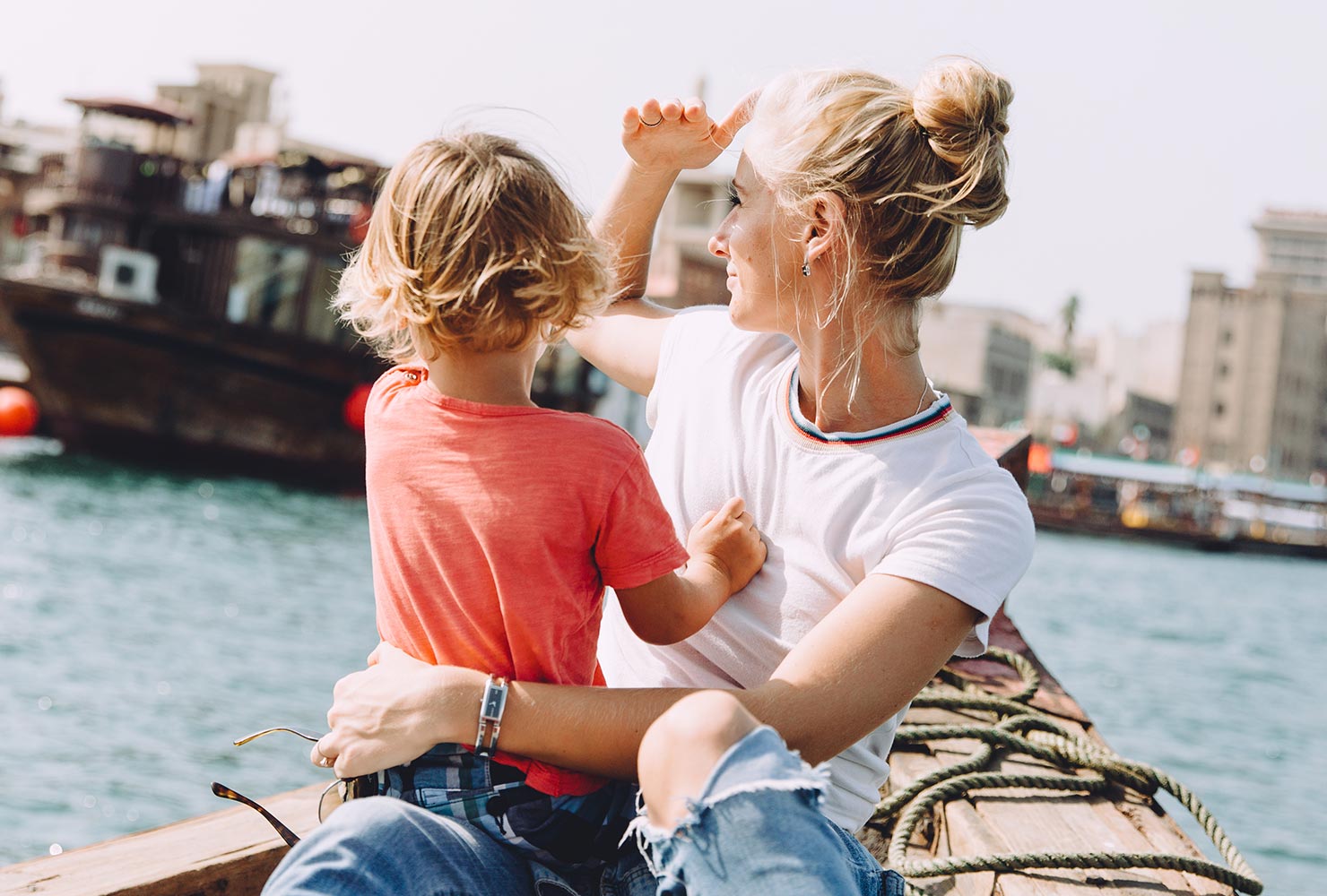mom and son on a boat ride