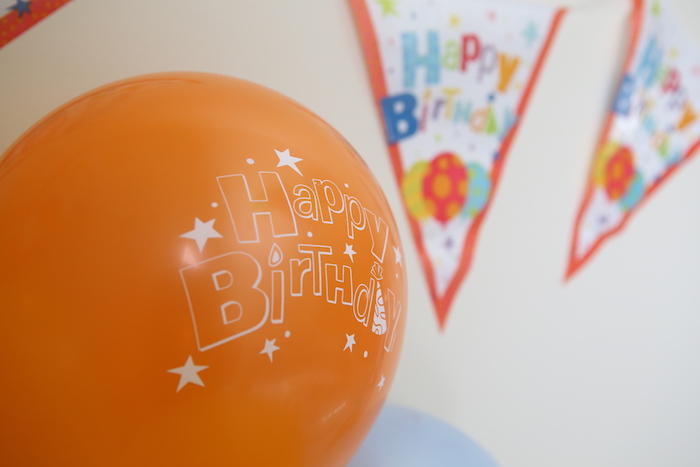 orange birthday balloon