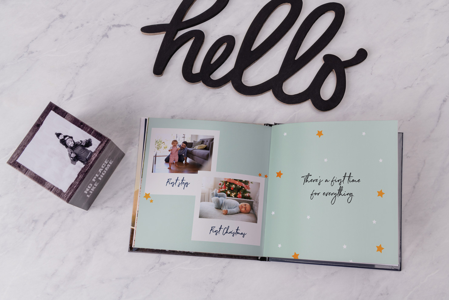 green memory photo album with baby photos in personalized design