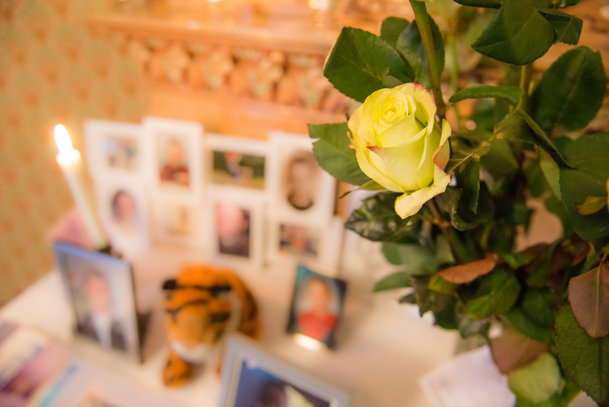 Yellow flower in memorial event for examples of celebration of life invitation wording.