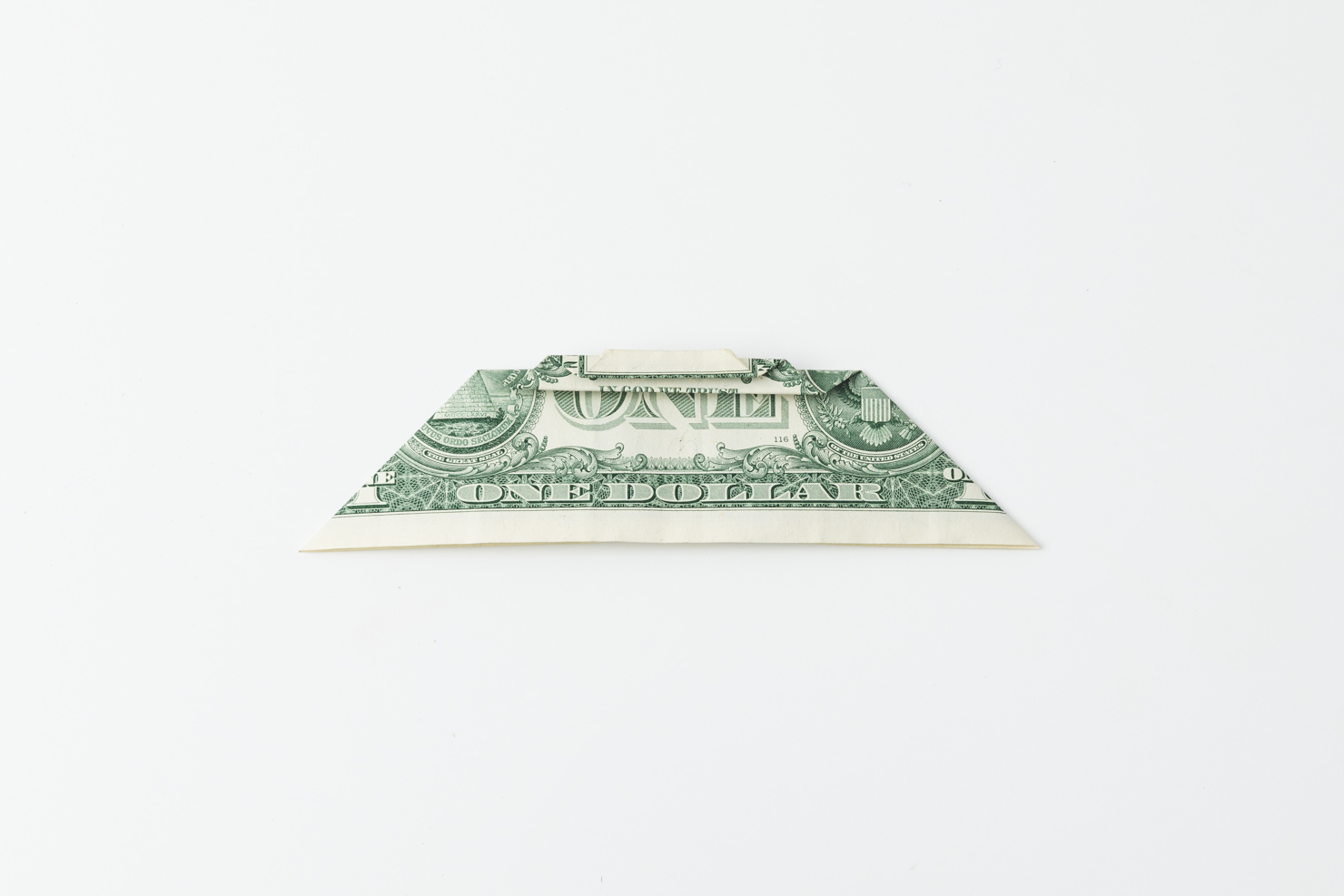 a dollar bill folded from the top