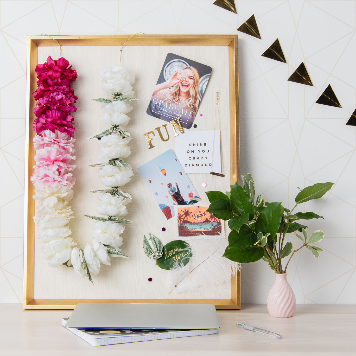 DIY money lei on a bulletin board