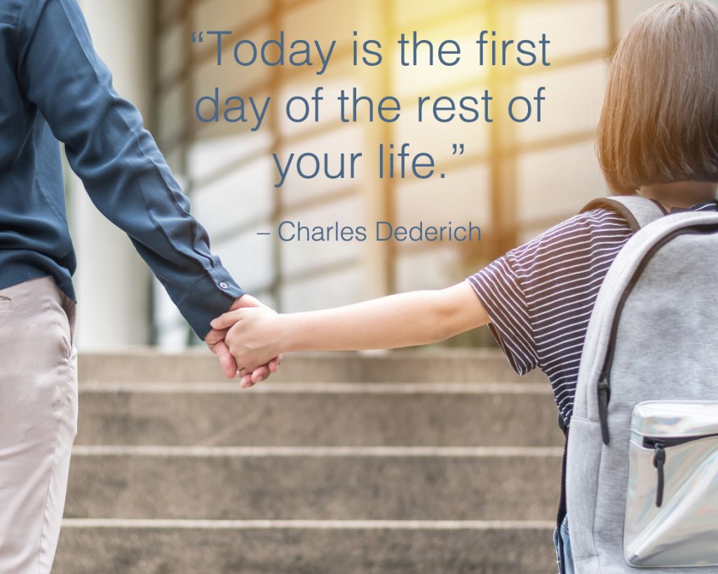 Elementary school girl is indoors in a classroom with school quotes overlay.