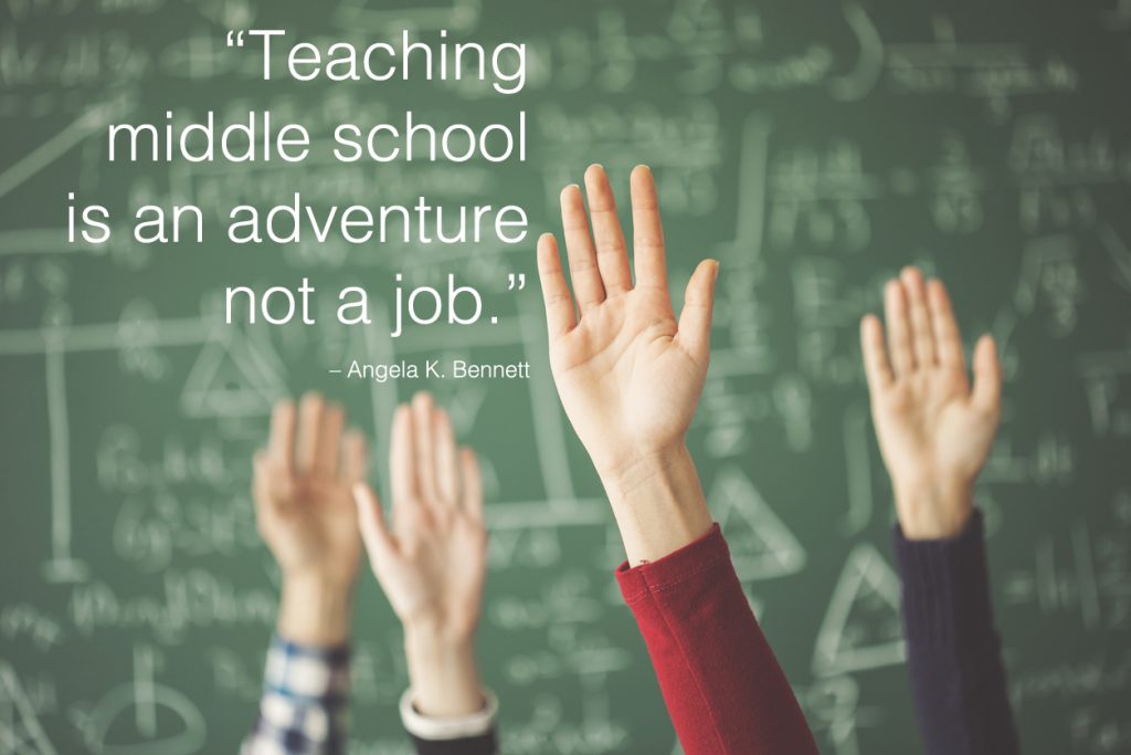 Students raised up hands green chalk board in classroom with school quotes overlay.