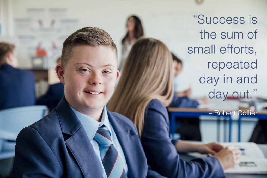 Teenage boy during a lesson with school quotes overlay.