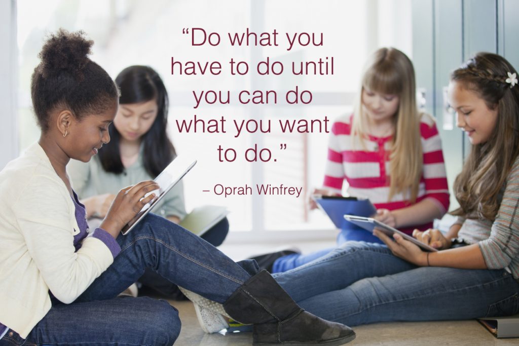 Teenagers sitting by school lockers with school quotes overlay.
