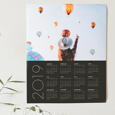 A poster calendar on display in a home.