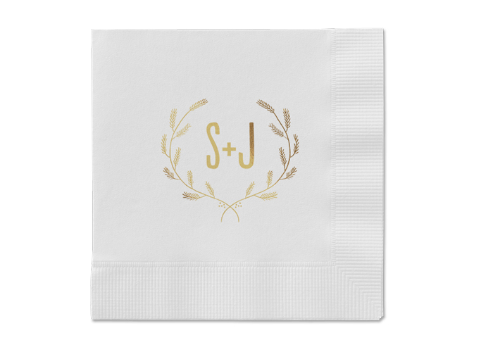 A set of personalized wedding napkins with initials.