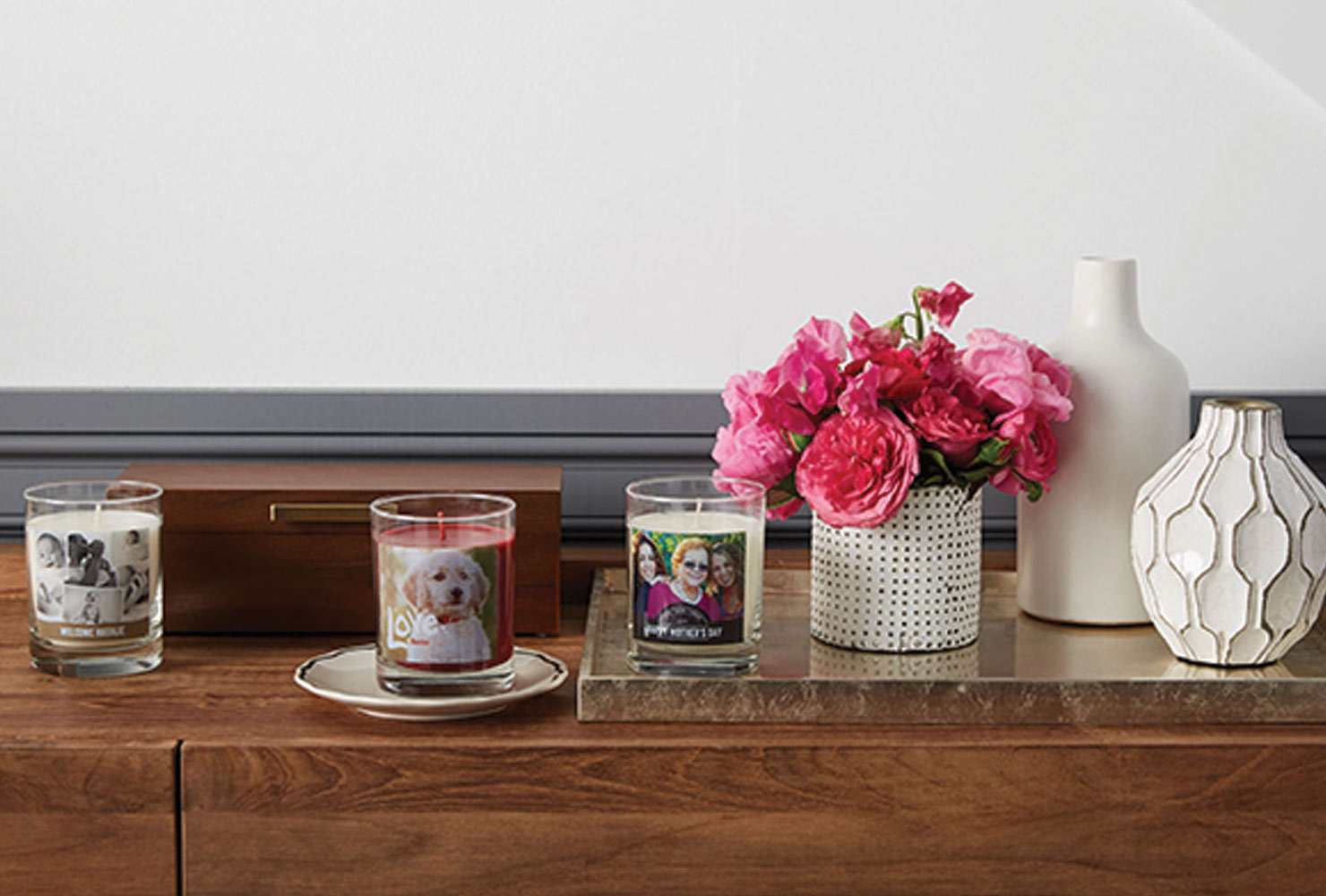 Photo candles on a desk.