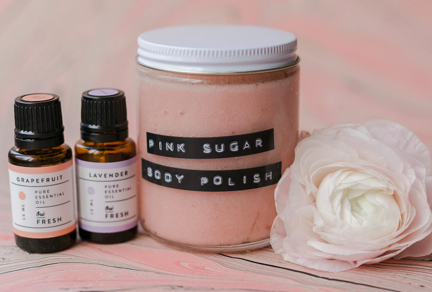 Jar of pink body scrub.