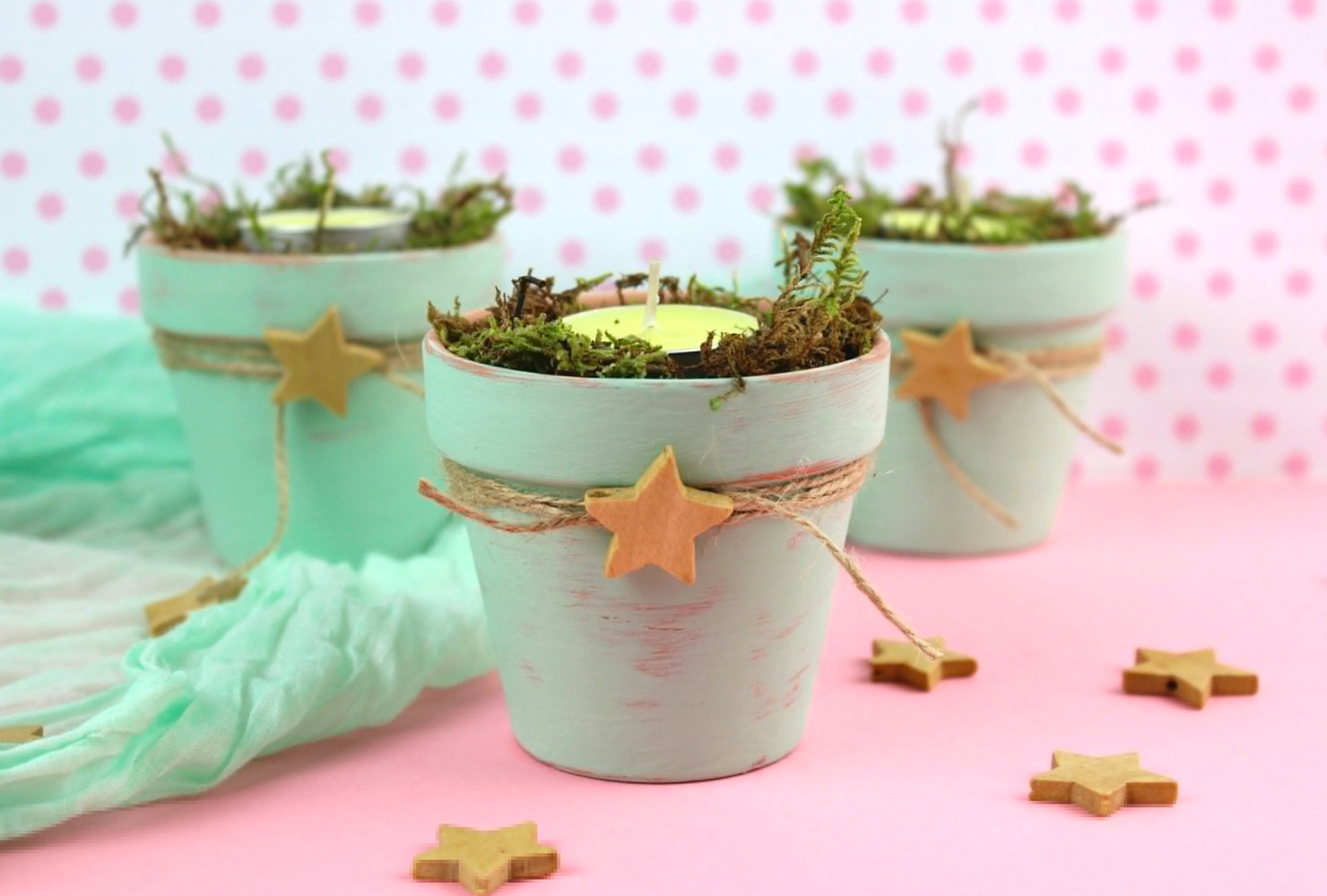 Light blue painted flower pots.