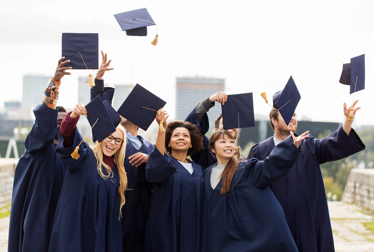 Grads throwing their caps in the air