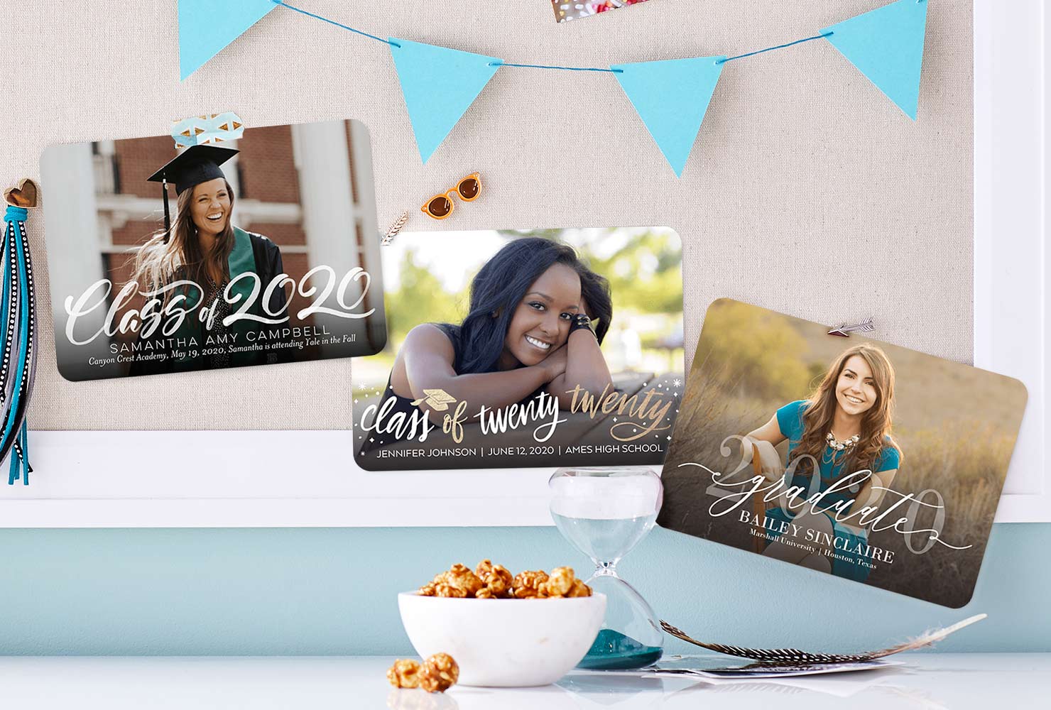 Graduation photo cards hanging on bulletin board