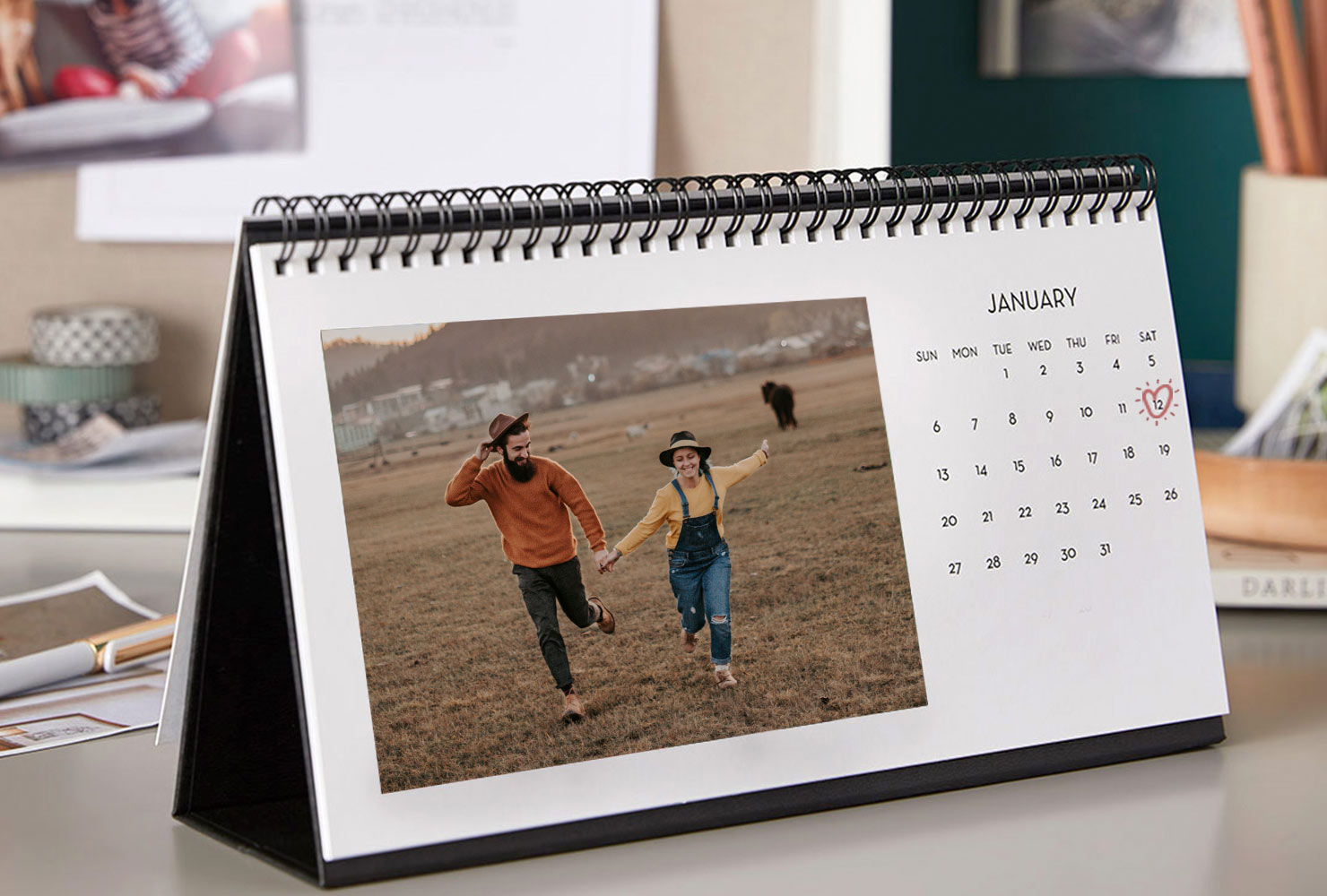 Desk calendar with image of couple. 