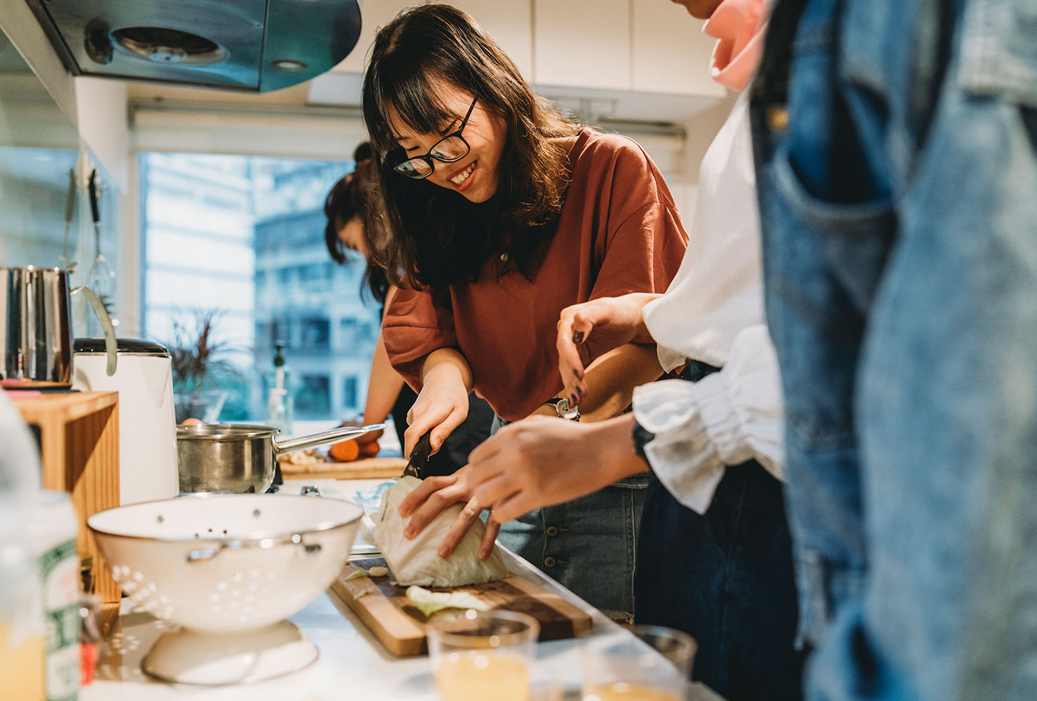 Friends cooking together.