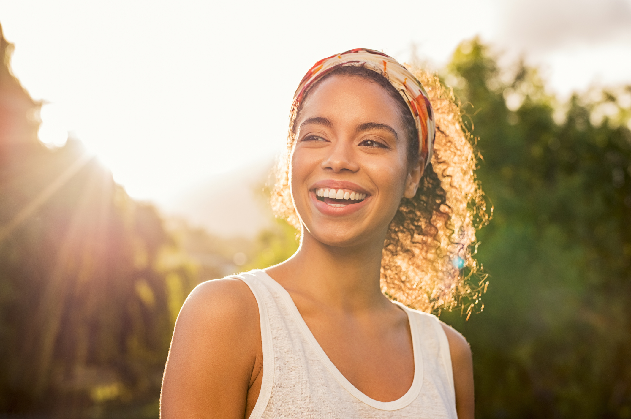 woman outdoors smiling